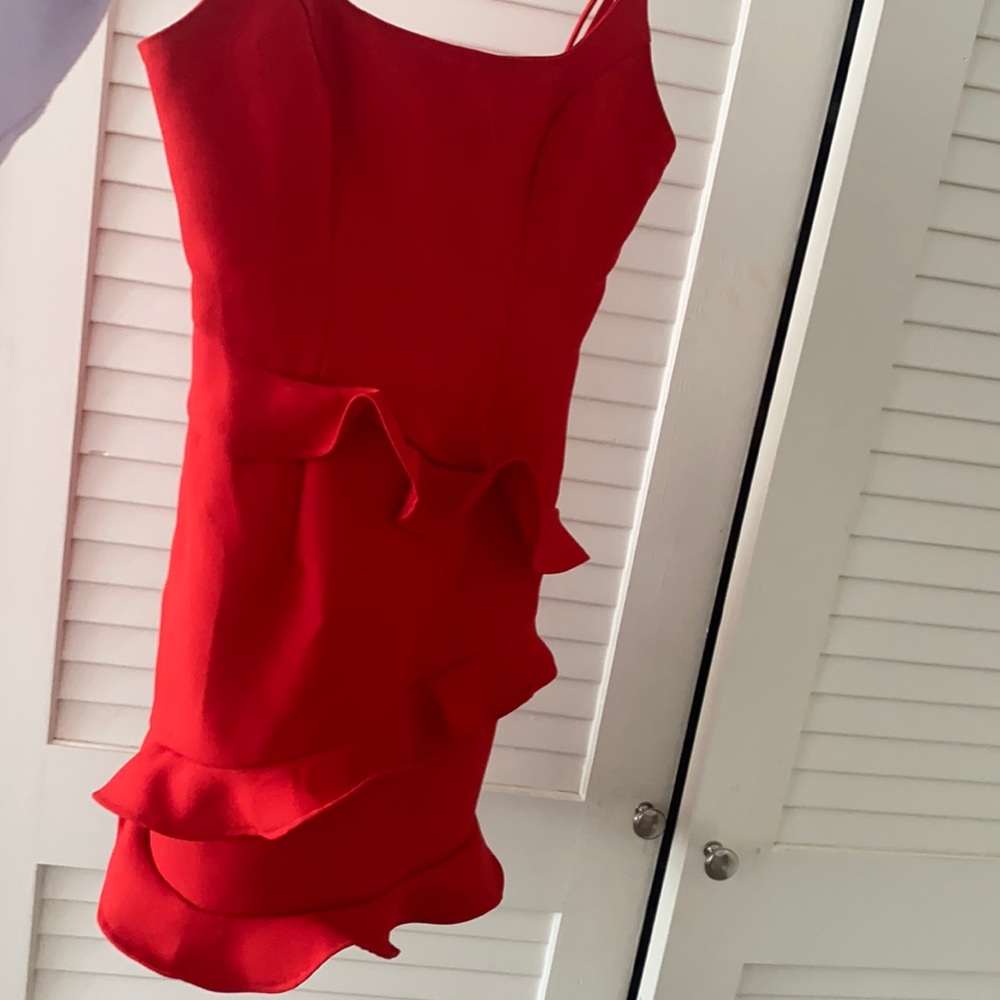 Saints + Secrets red ruffle dress